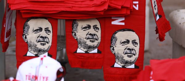 This picture taken on July 25, 2016, shows scarves with the effigy of Turkish President Recep Tayyip Erdogan a rally against the military coup in Ankara This picture taken on July 25, 2016, shows scarves with the effigy of Turkish President Recep Tayyip Erdogan a rally against the military coup in Ankara - Sputnik International