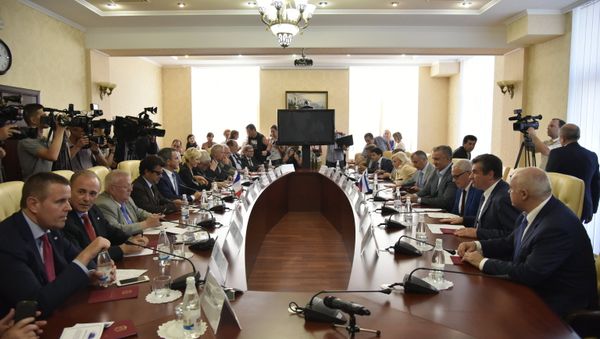 French MPs meet with Head of the Republic of Crimea Sergei Aksyonov, fourth right at the table, in Simferopol French MPs meet with Head of the Republic of Crimea Sergei Aksyonov, fourth right at the table, in Simferopol - Sputnik International