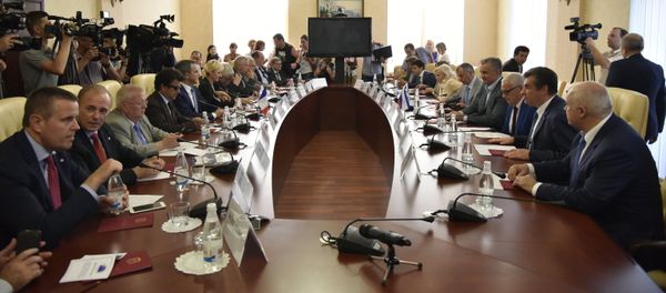French MPs meet with Head of the Republic of Crimea Sergei Aksyonov, fourth right at the table, in Simferopol French MPs meet with Head of the Republic of Crimea Sergei Aksyonov, fourth right at the table, in Simferopol - Sputnik International
