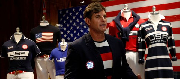 Cliff Meidl, two-time U.S. Olympic athlete, models the official Team USA Opening Ceremony flag bearer outfit which will include special electroluminescent panels, at the Polo Ralph Lauren store in New York City, U.S., July 29, 2016 Cliff Meidl, two-time U.S. Olympic athlete, models the official Team USA Opening Ceremony flag bearer outfit which will include special electroluminescent panels, at the Polo Ralph Lauren store in New York City, U.S., July 29, 2016 - Sputnik International