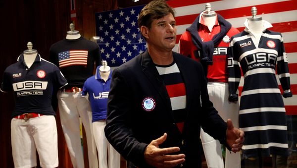 Cliff Meidl, two-time U.S. Olympic athlete, models the official Team USA Opening Ceremony flag bearer outfit which will include special electroluminescent panels, at the Polo Ralph Lauren store in New York City, U.S., July 29, 2016 - Sputnik International