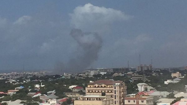 Two loud explosions with ensuing heard near the Criminal Investigation Department headquarters in Somalia's capital Mogadishu, witness reports Two loud explosions with ensuing heard near the Criminal Investigation Department headquarters in Somalia's capital Mogadishu, witness reports - Sputnik International