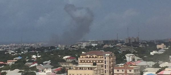 Two loud explosions with ensuing heard near the Criminal Investigation Department headquarters in Somalia's capital Mogadishu, witness reports - Sputnik International