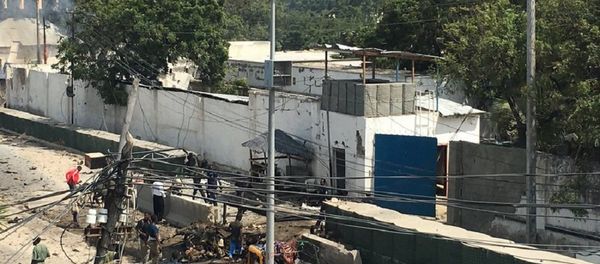 Two loud explosions with ensuing heard near the Criminal Investigation Department headquarters in Somalia's capital Mogadishu, witness reports Two loud explosions with ensuing heard near the Criminal Investigation Department headquarters in Somalia's capital Mogadishu, witness reports - Sputnik International