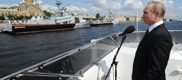 Russian President Vladimir Putin on the Serafim Sarovsky boat during a parade of ships held to celebrate the Navy Day in St. Petersburg Russian President Vladimir Putin on the Serafim Sarovsky boat during a parade of ships held to celebrate the Navy Day in St. Petersburg - Sputnik International