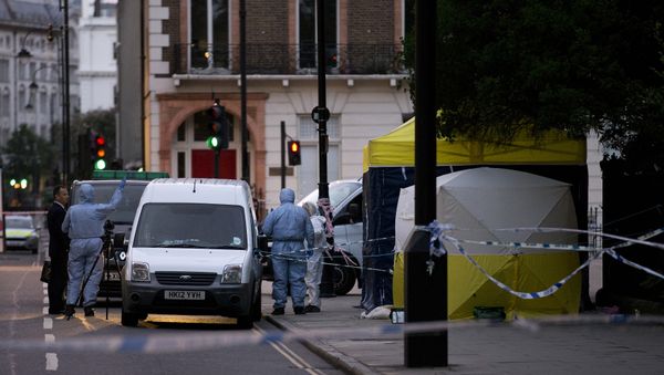 Police forensic officers work in Russell Square in London early on August 4, 2016, after a woman in her 60s was killed during a knife attack Police forensic officers work in Russell Square in London early on August 4, 2016, after a woman in her 60s was killed during a knife attack - Sputnik International