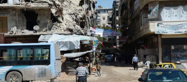 Local citizens continue to live in destroyed buildings in the Salah ad-Din District in Aleppo. Local citizens continue to live in destroyed buildings in the Salah ad-Din District in Aleppo. - Sputnik International