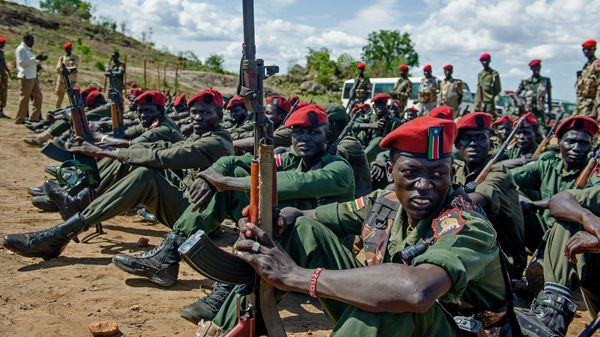 Sudan People's Liberation Army (SPLA) soldiers sit on the ground at a containment site outside of Juba (File) Sudan People's Liberation Army (SPLA) soldiers sit on the ground at a containment site outside of Juba (File) - Sputnik International