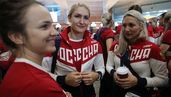 Members of the Russian Olympic handball team Polina Kuznetsova and Vladlena Bobrovnikova (right to left) at Sheremetyevo Airport Members of the Russian Olympic handball team Polina Kuznetsova and Vladlena Bobrovnikova (right to left) at Sheremetyevo Airport - Sputnik International