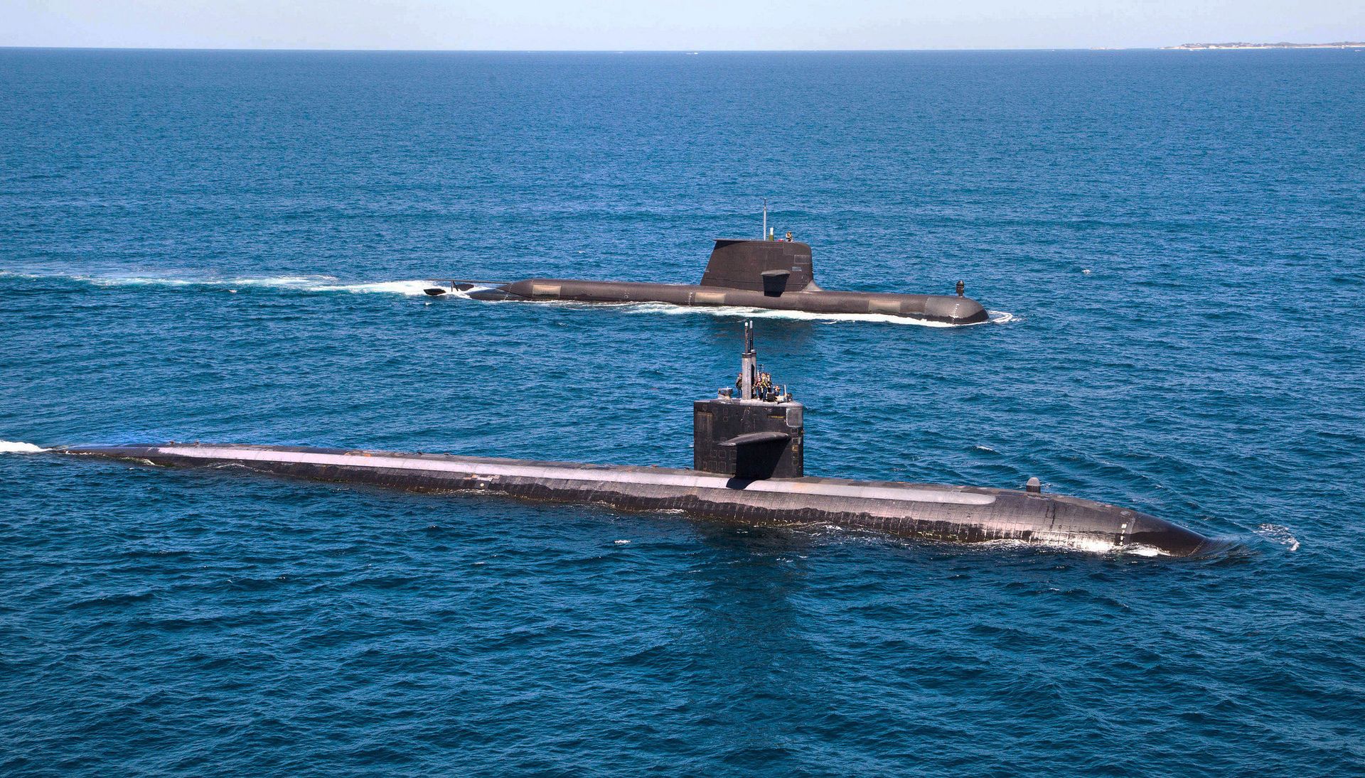 The U.S. Navy's Los Angeles-class fast attack submarine USS Albuquerque (SSN 706) and Royal Australian Navy Collins-class submarine HMAS Rankin (SSG 78) operate together in waters off Rottnest Island, Western Australia. The U.S. Navy's Los Angeles-class fast attack submarine USS Albuquerque (SSN 706) and Royal Australian Navy Collins-class submarine HMAS Rankin (SSG 78) operate together in waters off Rottnest Island, Western Australia. - Sputnik International, 1920, 19.09.2021