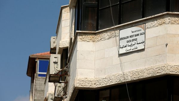 Christian charity World Vision organization is seen at a building housing the organisation's office in Gaza City August 4, 2016 - Sputnik International