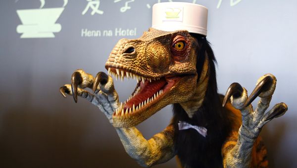 In this July 15, 2015 photo, a receptionist dinosaur robot performs at the new robot hotel, aptly called Henn na Hotel or Weird Hotel, in Sasebo, southwestern Japan - Sputnik International