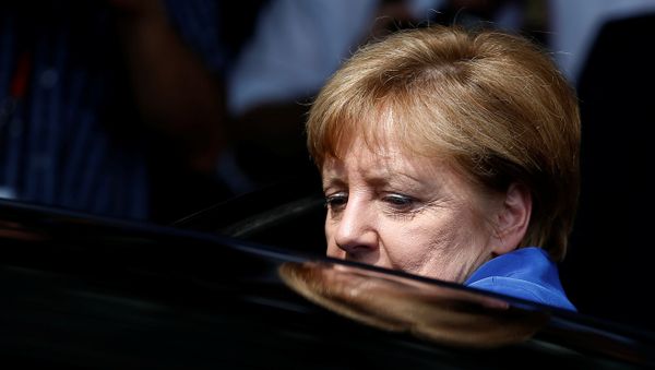 German Chancellor Angela Merkel leaves a news conference in Berlin, Germany (File) German Chancellor Angela Merkel leaves a news conference in Berlin, Germany (File) - Sputnik International