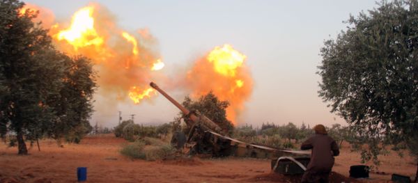 Opposition fighters fire shells from their position in Aleppo's southern countryside (File) - Sputnik International