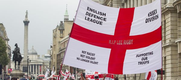 Supporters of the far-right English Defence League (EDL) display banners and flags take part in a march in London on September 20, 2014 Supporters of the far-right English Defence League (EDL) display banners and flags take part in a march in London on September 20, 2014 - Sputnik International