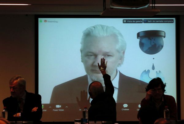 WikiLeaks founder Julian Assange appears on screen via video link during his participation as a guest panelist in an International Seminar on the 60th anniversary of the college of Journalists of Chile in Santiago, Chile, July 12, 2016 WikiLeaks founder Julian Assange appears on screen via video link during his participation as a guest panelist in an International Seminar on the 60th anniversary of the college of Journalists of Chile in Santiago, Chile, July 12, 2016 - Sputnik International