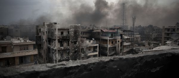 In this Tuesday, Oct. 2, 2012 file photo, smoke rises over Saif Al Dawla district, in Aleppo, Syria In this Tuesday, Oct. 2, 2012 file photo, smoke rises over Saif Al Dawla district, in Aleppo, Syria - Sputnik International
