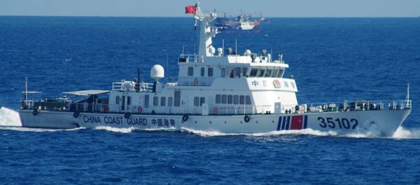 In this photo released by the 11th Regional Coast Guard Headquarters of Japan, a Chinese coast guard vessel sails near disputed East China Sea islands Saturday, Aug. 6, 2016 In this photo released by the 11th Regional Coast Guard Headquarters of Japan, a Chinese coast guard vessel sails near disputed East China Sea islands Saturday, Aug. 6, 2016 - Sputnik International