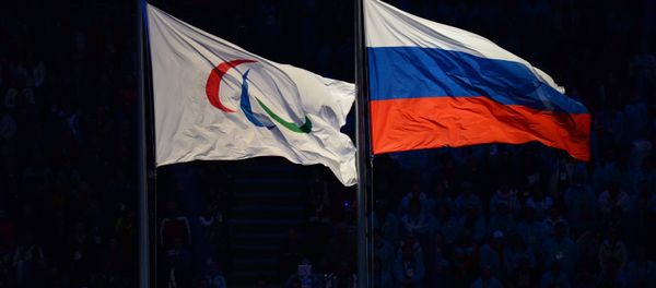 The Paralympic flag and the Russian national flag. (File) - Sputnik International