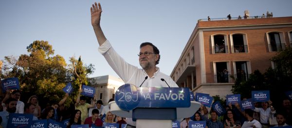 Leader of the People's Party (PP) and Spain's caretaker Prime Minister and party candidate, Mariano Rajoy, waves to supporters during a campaign meeting in Malaga. (File) Leader of the People's Party (PP) and Spain's caretaker Prime Minister and party candidate, Mariano Rajoy, waves to supporters during a campaign meeting in Malaga. (File) - Sputnik International