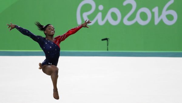 US gymnast Simone Biles competes in the qualifying for the women's Floor event of the Artistic Gymnastics at the Olympic Arena during the Rio 2016 Olympic Games in Rio de Janeiro on August 7, 2016. US gymnast Simone Biles competes in the qualifying for the women's Floor event of the Artistic Gymnastics at the Olympic Arena during the Rio 2016 Olympic Games in Rio de Janeiro on August 7, 2016. - Sputnik International