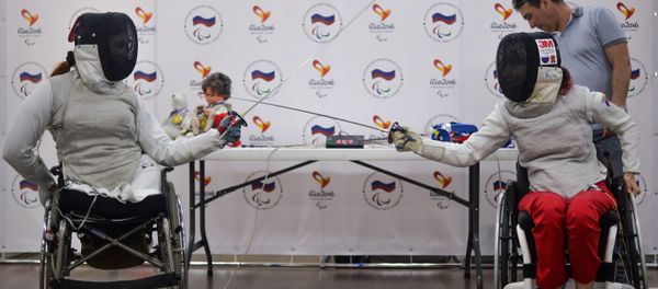 Kseniya Ovsyannikova (right) and Anna Petukhova, members of the Russian wheeled fencing team, attending a press conference on Paralympic Games in Rio de Janeiro Kseniya Ovsyannikova (right) and Anna Petukhova, members of the Russian wheeled fencing team, attending a press conference on Paralympic Games in Rio de Janeiro - Sputnik International