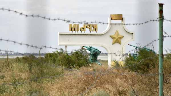 Stele with the word Crimea at Jankoi border crossing point on Russia-Ukraine border Stele with the word Crimea at Jankoi border crossing point on Russia-Ukraine border - Sputnik International