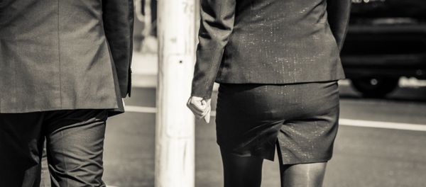Man and woman dressed in suits - Sputnik International