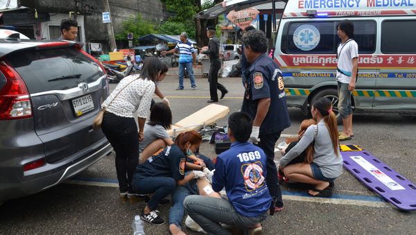 Injured people receive first aid after a bomb exploded on August 11, 2016 in Trang, Thailand. Picture taken August 11, 2016 Injured people receive first aid after a bomb exploded on August 11, 2016 in Trang, Thailand. Picture taken August 11, 2016 - Sputnik International