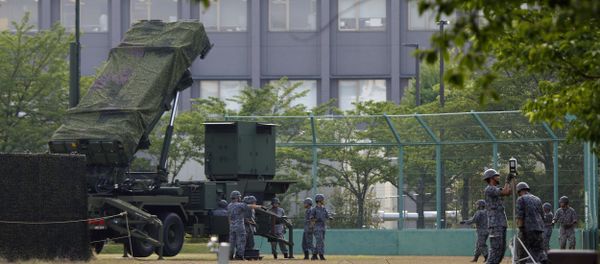 Japan Self-Defense Force members set up a PAC-3 Patriot missile unit in case of a North Korean rocket launch at the Defense Ministry in Tokyo, Tuesday, June 21, 2016 - Sputnik International