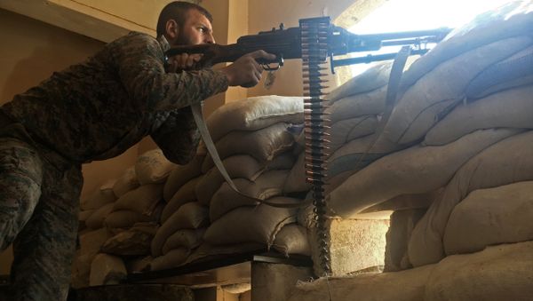 A Syrian army soldier during the assault on the artillery school in the south-east of Aleppo, Syria A Syrian army soldier during the assault on the artillery school in the south-east of Aleppo, Syria - Sputnik International