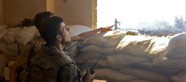 Syrian army troops during the assault on the artillery school in the south-east of Aleppo, Syria Syrian army troops during the assault on the artillery school in the south-east of Aleppo, Syria - Sputnik International