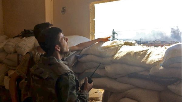 Syrian army troops during the assault on the artillery school in the south-east of Aleppo, Syria Syrian army troops during the assault on the artillery school in the south-east of Aleppo, Syria - Sputnik International