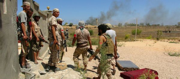 Libyan forces allied with the U.N.-backed government prepare to capture university buildings during a battle with IS fighters in Sirte, Libya, August 10, 2016 - Sputnik International