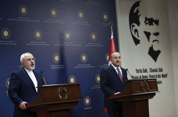 Turkish Foreign Minister Mevlut Cavusoglu (R) and his Iranian counterpart Mohammad Javad Zarif address a joint press conference following their meeting, next to a picture of Mustafa Kemal Ataturk, founder of the Turkish Republic, at the Foreign Ministry in Ankara on August 12, 2016 Turkish Foreign Minister Mevlut Cavusoglu (R) and his Iranian counterpart Mohammad Javad Zarif address a joint press conference following their meeting, next to a picture of Mustafa Kemal Ataturk, founder of the Turkish Republic, at the Foreign Ministry in Ankara on August 12, 2016 - Sputnik International