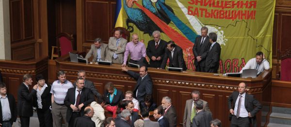 Deputies of opposition factions block the Presidium of the Verkhovna Rada demanding that the parliament not discuss a bill that would give the Russian language official status in Ukraine Deputies of opposition factions block the Presidium of the Verkhovna Rada demanding that the parliament not discuss a bill that would give the Russian language official status in Ukraine - Sputnik International