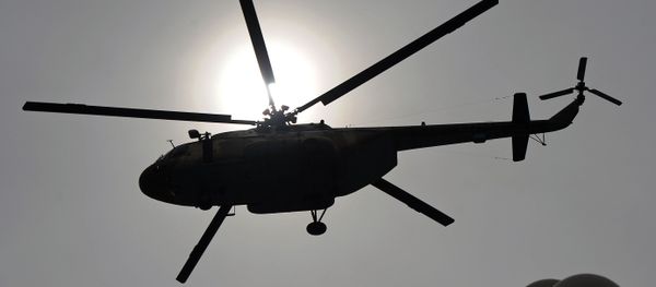 This file photo taken on March 23, 2014 shows a Pakistani Air Force Mi-17 helicopter flies over the Presidential Palace during a parade marking the country's National Day in Islamabad This file photo taken on March 23, 2014 shows a Pakistani Air Force Mi-17 helicopter flies over the Presidential Palace during a parade marking the country's National Day in Islamabad - Sputnik International