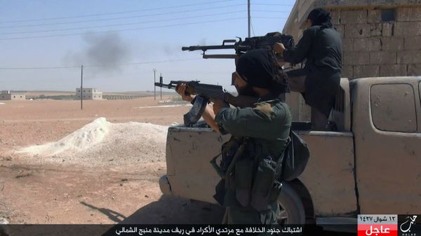 Islamic State fighters fire their weapons during clashes with the Kurdish-led Syria Democratic Forces in Manbij, in Aleppo province, Syria (File) Islamic State fighters fire their weapons during clashes with the Kurdish-led Syria Democratic Forces in Manbij, in Aleppo province, Syria (File) - Sputnik International