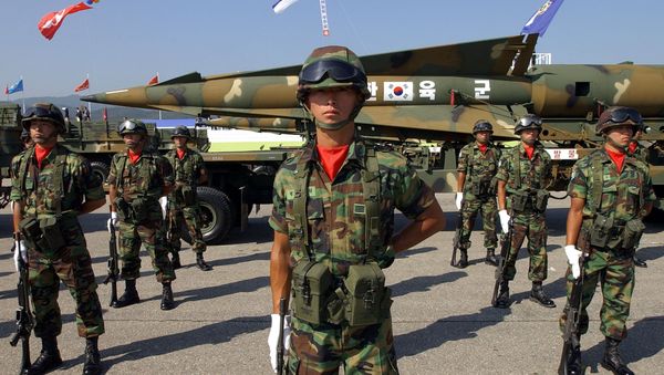 South Korean artillery soldiers stand in front of the Hyunmoo Surface to Surface Missile during Armed Forces Day rehearsal, at the Seongnam military airport, outskirts of Seoul (File) South Korean artillery soldiers stand in front of the Hyunmoo Surface to Surface Missile during Armed Forces Day rehearsal, at the Seongnam military airport, outskirts of Seoul (File) - Sputnik International