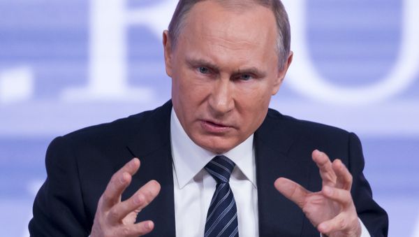 Russian President Vladimir Putin gestures during his annual end of year news conference in Moscow, Russia, Thursday, Dec. 17, 2015 - Sputnik International