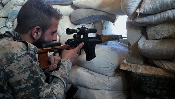 Syria. A Syrian Army soldier at the front line against a military logistics school in southern Aleppo Syria. A Syrian Army soldier at the front line against a military logistics school in southern Aleppo - Sputnik International