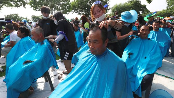 More than 900 Seongju residents have their heads shaved during a protest against the planned deployment of the US Terminal High Altitude Area Defense (THAAD) system at a local park in the southeastern town of Seongju on August 15, 2016 More than 900 Seongju residents have their heads shaved during a protest against the planned deployment of the US Terminal High Altitude Area Defense (THAAD) system at a local park in the southeastern town of Seongju on August 15, 2016 - Sputnik International