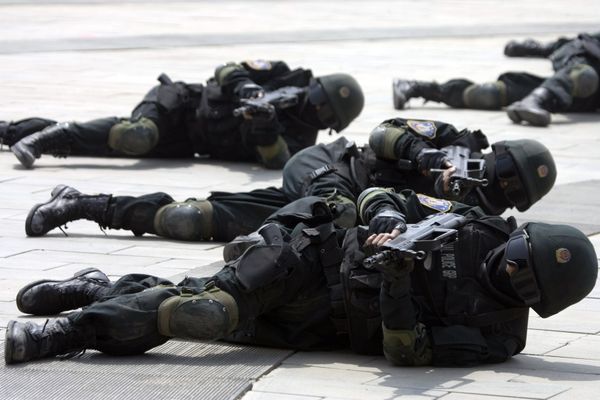Special police forces demonstrate their craft during a drill to mark the launch of a training program on Beijing Olympic Games security held at the Beijing People's Police Institute on the outskirts of Beijing, China. file photo  - Sputnik International