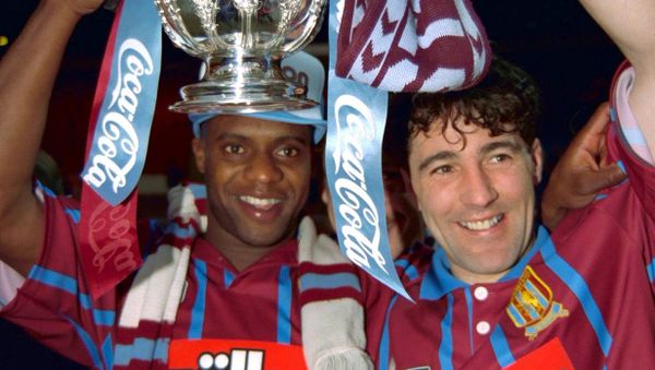 Britain Football Soccer - Aston Villa v Manchester United - Coca Cola Cup Final - 27/3/94 Aston Villa's Dalian Atkinson and Dean Saunders celebrate with the trophy. - Sputnik International
