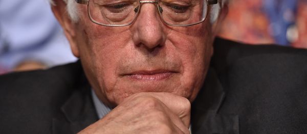 Senator Bernie Sanders looks on after the Vermont delegation cast their votes during roll call on the second day of the Democratic National Convention at the Wells Fargo Center, July 26, 2016 - Sputnik International