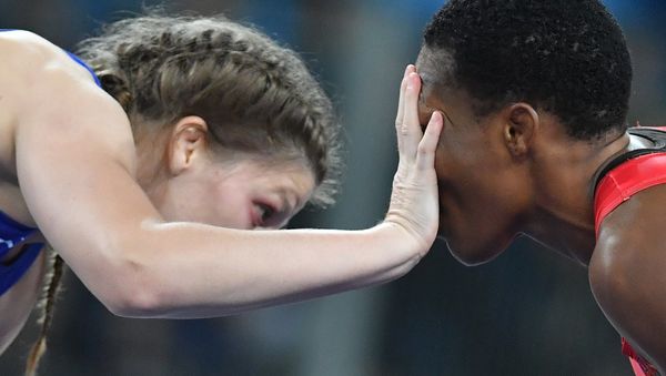 Female wrestler Ekaterina Bukina won bronze in women's freestyle 75 kg defeating Annabel Laure Ali from Cameroon. Female wrestler Ekaterina Bukina won bronze in women's freestyle 75 kg defeating Annabel Laure Ali from Cameroon. - Sputnik International