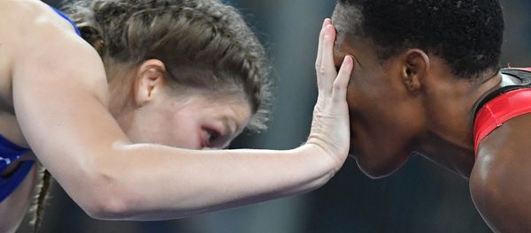 Female wrestler Ekaterina Bukina won bronze in women's freestyle 75 kg defeating Annabel Laure Ali from Cameroon. - Sputnik International
