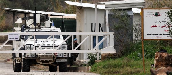 A Spanish soldier of the United Nations Interim Forces in Lebanon (UNIFIL) guards a checkpoint in southern Lebanese village of Wazzani next to the divided village of Ghajar on border with Israel on January 5, 2016 A Spanish soldier of the United Nations Interim Forces in Lebanon (UNIFIL) guards a checkpoint in southern Lebanese village of Wazzani next to the divided village of Ghajar on border with Israel on January 5, 2016 - Sputnik International