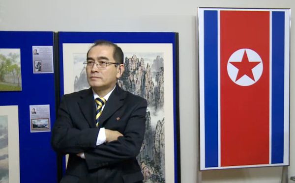 In a video grab created on August 17, 2016 taken from footage recorded by AFPTV on November 3, 2014 deputy ambassador at the North Korean embassy in London, Thae Yong-ho, stands in front of an artwork during a photocall to view an exhibition of North Korean art at the North Korean embassy in west London In a video grab created on August 17, 2016 taken from footage recorded by AFPTV on November 3, 2014 deputy ambassador at the North Korean embassy in London, Thae Yong-ho, stands in front of an artwork during a photocall to view an exhibition of North Korean art at the North Korean embassy in west London - Sputnik International