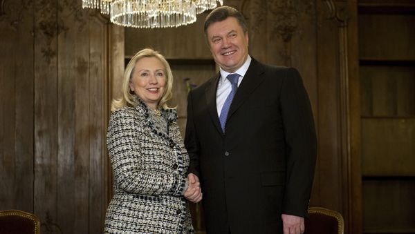 US Secretary of State Hillary Clinton shaking hands with Ukrainian President Viktor Yanukovych during a bilateral meeting at the 48th Munich Security Conference, 2012. Two years earlier, Clinton traveled to Ukraine directly to meet with the president. - Sputnik International